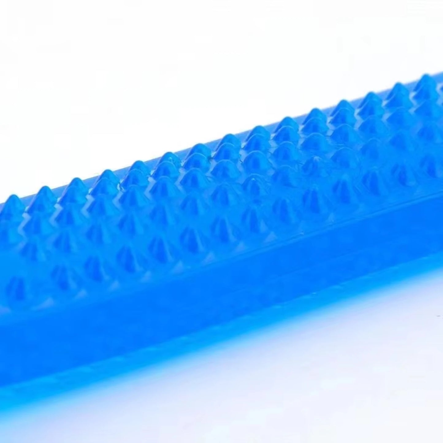 Rubber chew toy for puppies and do, durable and comes in Red, Orange, Blue or Green.