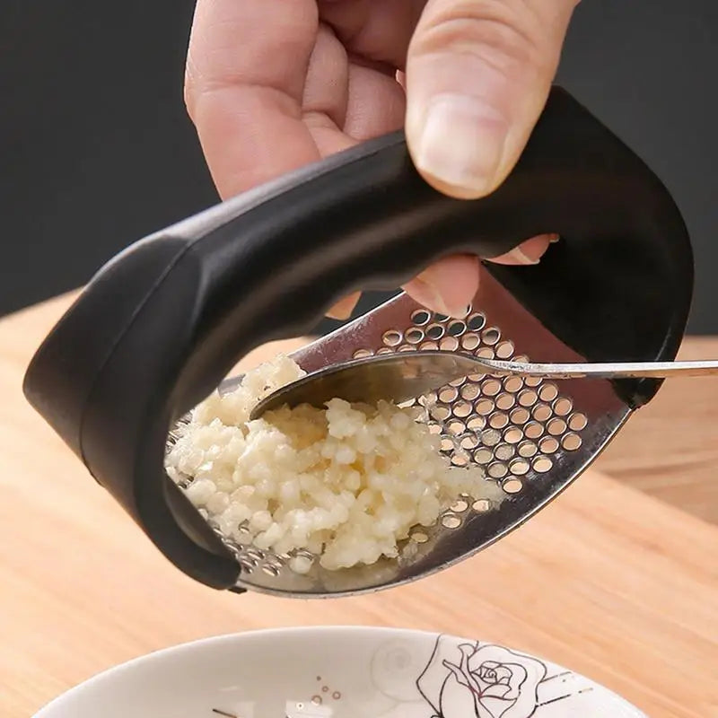 Stainless Steel Garlic Press/Crusher, Manual Minced or Chopped Garlic t