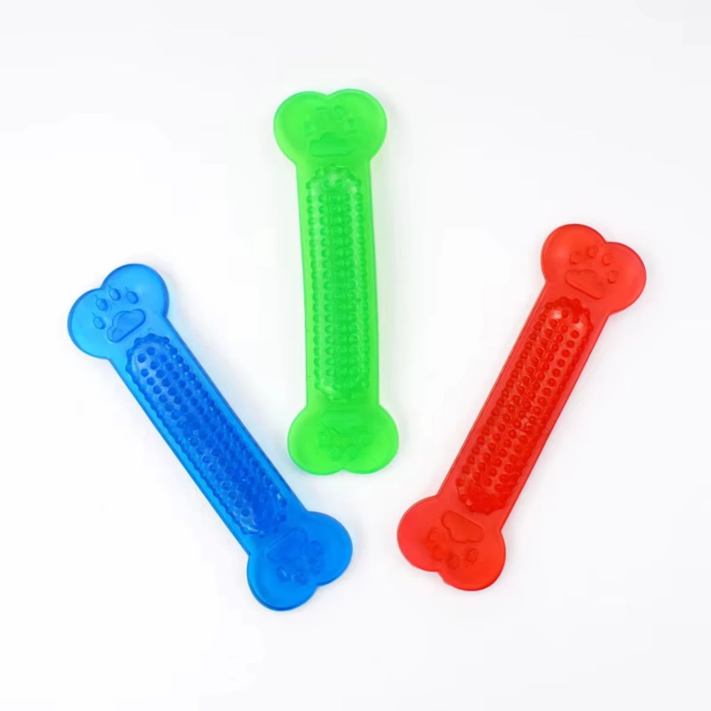 Rubber chew toy for puppies and do, durable and comes in Red, Orange, Blue or Green.