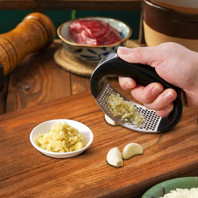 Stainless Steel Garlic Press/Crusher, Manual Minced or Chopped Garlic t